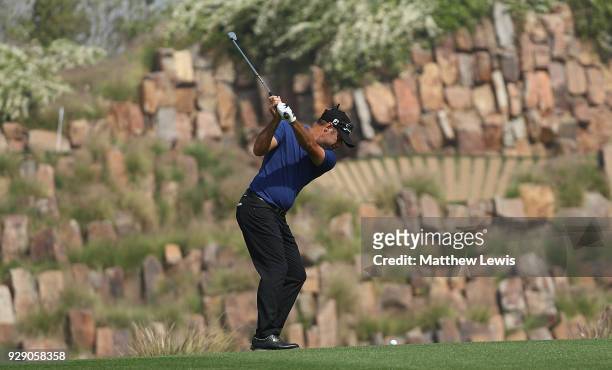 Terry Pilkadaris of Australia plays his second shot on the 17th hole during day one of the Hero Indian Open at Dlf Golf and Country Club on March 8,...