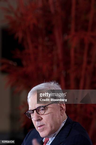 David Rubenstein, co-founder and managing director of the Carlyle Group, speaks at the Eighth China Financial Markets Conference in Beijing, China,...