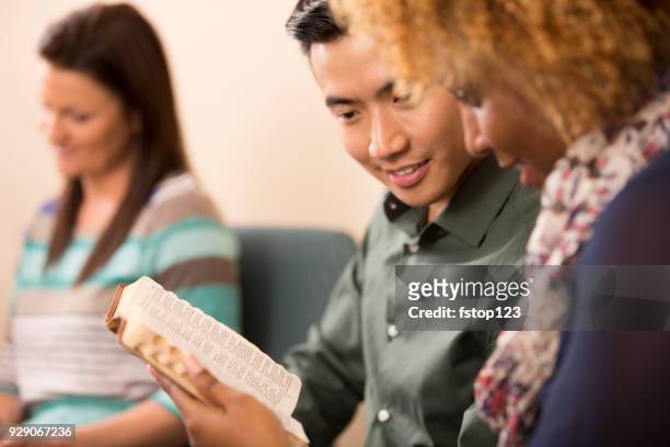 multi-ethnic, mixed age bible study group. - church group stock pictures, royalty-free photos & images