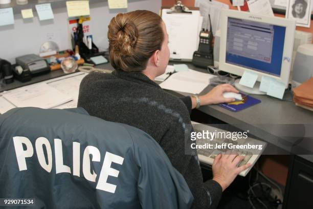 Female on a computer monitor in the North Miami Beach Police Department.