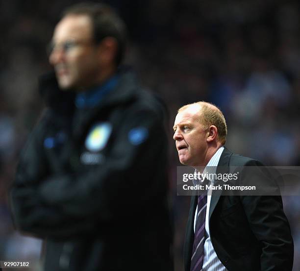 Manager of Bolton Wanderers Gary Megson with Aston Villa manager Martin O'Neill in the forground during the Barclays Premier League match between...