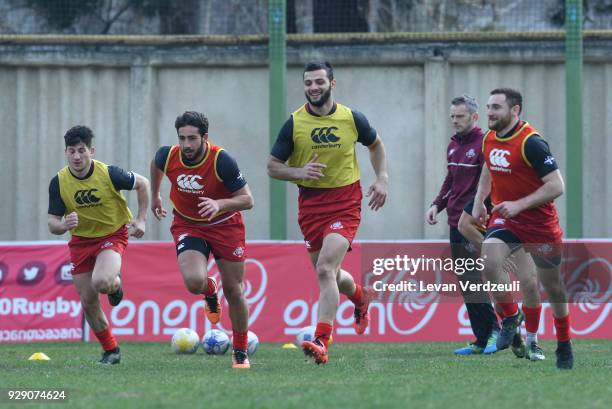 Gela Aprasidze, Giorgi Kveseladze, Giorgi Koshadze and Vasil Lobzhanidze run during the Georgian rugby national team training session at Shevardeni...