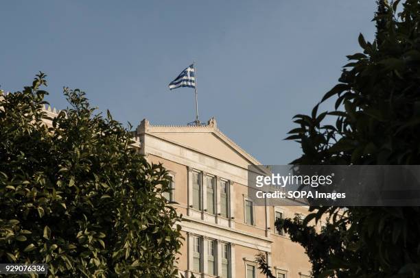 The Greek parliament in Athens. In front of the parliament is the monument for the unknown soldier where the Changing Of The Guard ceremony takes...