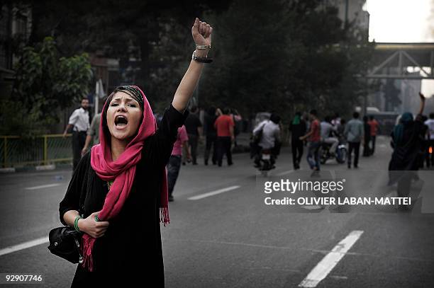 Supporter of defeated Iranian presidential candidate Mir Hossein Mousavi shouts slogans during riots in Tehran on June 13, 2009. Hardline incumbent...
