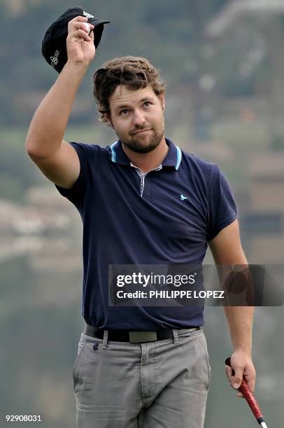 Golfer Ryan Moore acknowleges the crowd during the HSBC Champions golf tournament in Shanghai on November 8, 2009. US golfer Phil Mickelson held off...