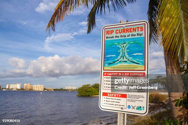 Rip currents safety sign at Punta Rassa Park.
