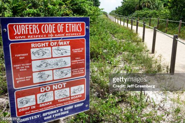 Surfers code of ethics sign at Fort Pierce Inlet State Park.