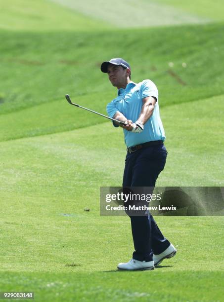 Matteo Manassero of Italy plays his third shot on the 8th hole during day one of the Hero Indian Open at Dlf Golf and Country Club on March 8, 2018...