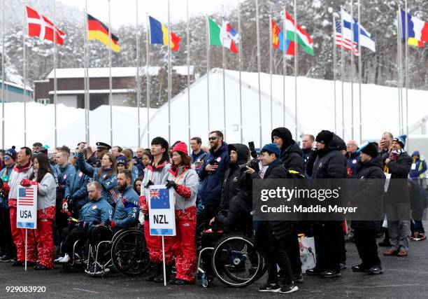 Members of the New Zealand and United States paralympic team during the Welcoming Ceremony at the PyeongChang Olympic Village ahead of the...