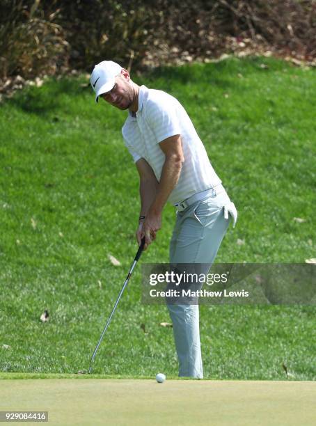 Chris Wood of England putts on the 3rd green during day one of the Hero Indian Open at Dlf Golf and Country Club on March 8, 2018 in New Delhi, India.