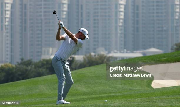 Chris Wood of England plays his second shot on the 4th hole during day one of the Hero Indian Open at Dlf Golf and Country Club on March 8, 2018 in...