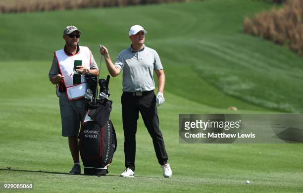 Graeme Storm of England assesses his second shot on the 1st hole during day one of the Hero Indian Open at Dlf Golf and Country Club on March 8, 2018...