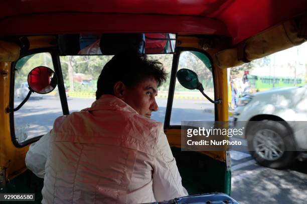 Sunita Choudhary, 40 - North India's first auto-rickshaw driver - turns her auto-rickshaw in a street on 6th March, 2018 in New Delhi. Sunita...