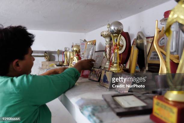 Sunita Choudhary - North India's first auto-rickshaw driver - shows the multiple awards and recognitions achieved by her over the years. She is often...