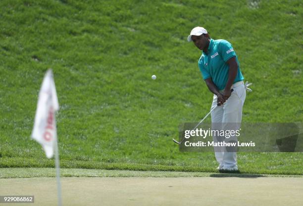 Chawrasia of India chips onto the 4th green during day one of the Hero Indian Open at Dlf Golf and Country Club on March 8, 2018 in New Delhi, India.