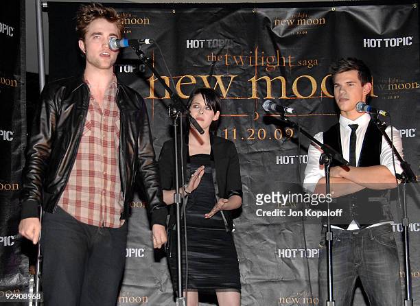 Actor Robert Pattinson, actress Kristen Stewart and actor Taylor Lautner speak at "The Twilight Saga: New Moon" - Cast Tour at Hot Topic on November...