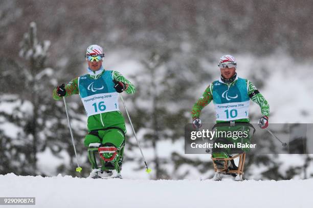 Arkadz Shykuts and Yauheni Lukyanenka of Belarus in action during a training session ahead of the PyeongChang 2018 Paralympic Games on March 8, 2018...