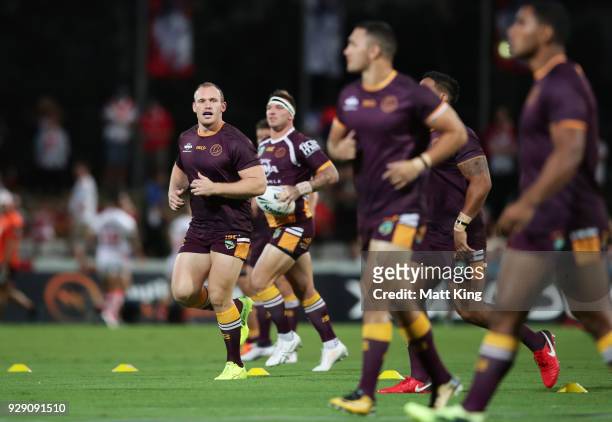 Matthew Lodge of the Broncos warms up before the round one NRL match between the St George Illawarra Dragons and the Brisbane Broncos at UOW Jubilee...