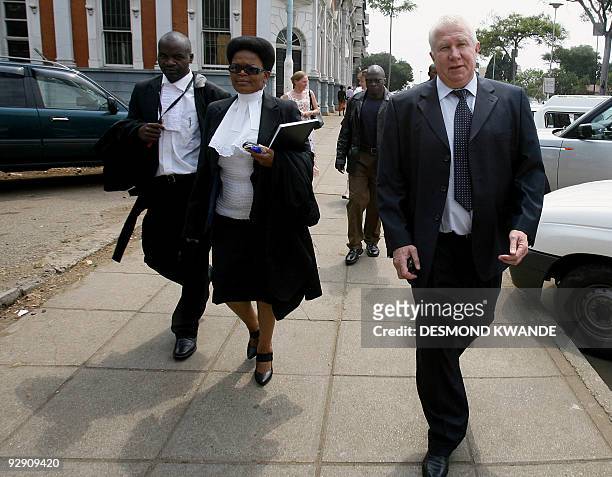 Top aide to Zimbabwe's Prime Minister Morgan Tsvangirai, Roy Bennett arrives at the Zimbabwe High Court for the start of his trial on November 9,...