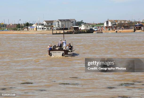 Ferry boat at mouth River Deben, Bawdsey Quay, Suffolk, England looking to Felixstowe Ferry.