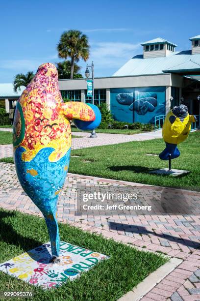 Fiberglass statues outside the Manatee Observation and Education Center.
