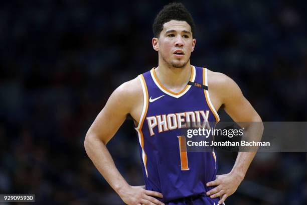 Devin Booker of the Phoenix Suns reacts during the first half against the New Orleans Pelicans at the Smoothie King Center on February 26, 2018 in...