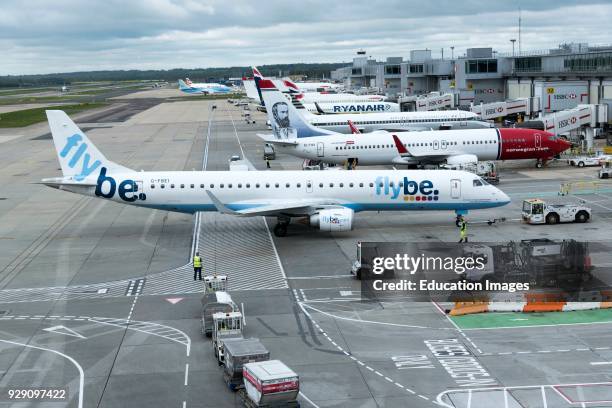 Flybe Embraer plane on push back.