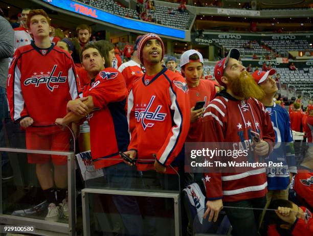 Captials fans what outside of the Caps locker room entrace before warm ups as the Washington Capitals play the Pittsburgh Penguins in game 7 of the...