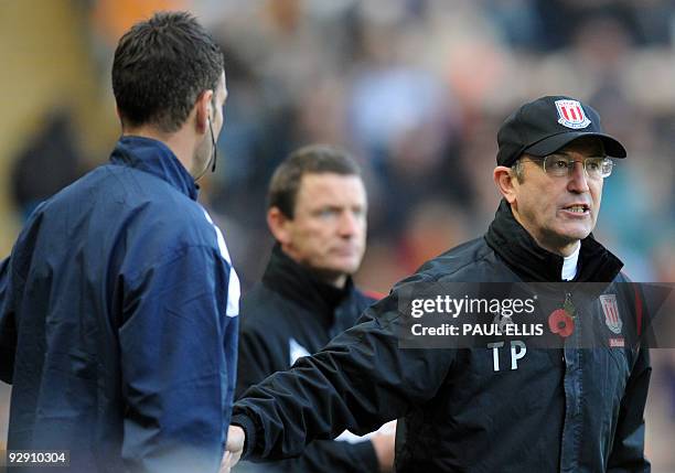 Stoke City manager Tony Pulis speaks to the fourth official during the English Premier League football match between Hull City and Stoke City at The...