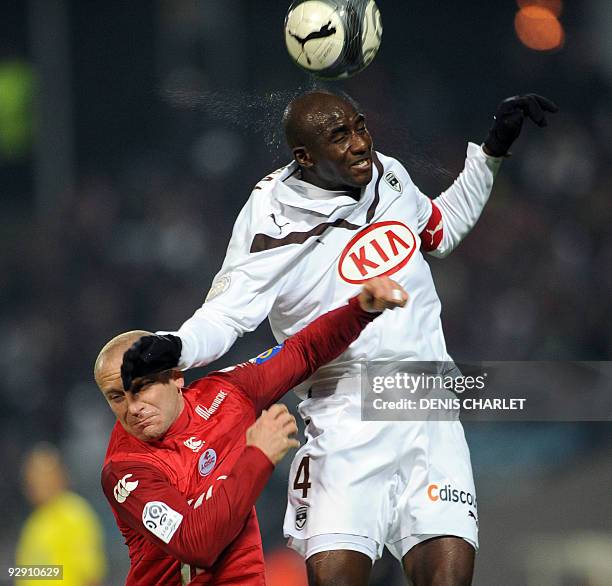 Lille's French midfielder Florent Balmont vies with Bordeaux's French midfielder Diarra Alou during the French L1 football match Lille vs Bordeaux on...