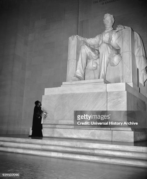 Marian Anderson Standing at Statue of Abraham Lincoln, Lincoln Memorial, Washington DC, USA, Harris & Ewing, April 1939.