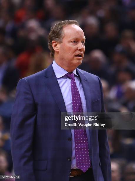 Head Coach Mike Budenholzer of the Atlanta Hawks looks on during a time out in the first half of an NBA game against the Toronto Raptors at Air...