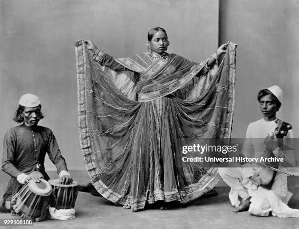 Nautch Girl Dancing with Accompanying Musicians, Calcutta, India, 1900.