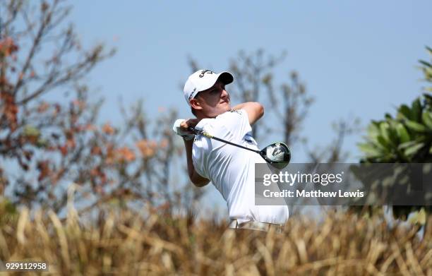 Emiliano Grillo of Argentina tees off on the 4th hole during day one of the Hero Indian Open at Dlf Golf and Country Club on March 8, 2018 in New...