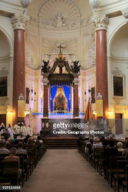 Religious service inside the Carmelite church, Basilica of Our Lady of Mount Carmel, Valletta, Malta.