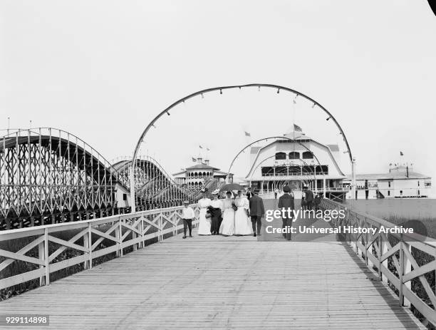 Roller Coaster along Boardwalk Leading to Casino, Lake Erie Park and Casino, Toledo, Ohio, USA, Detroit Publishing Company, 1905.