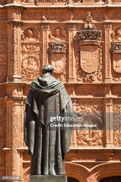 Salamanca, Salamanca Province, Spain. Statue of Augustinian friar Fray Luis Ponce de León 1527 – 1591 by Nicasio Sevilla in front of the 16th century...