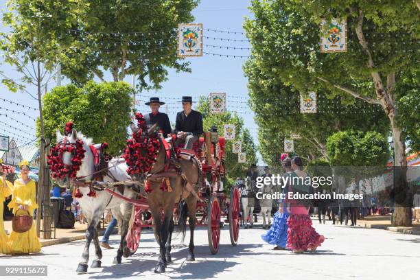 Seville, Seville Province, Andalusia, southern Spain, Feria de Abril, the April Fair, Horse and carriage parade.