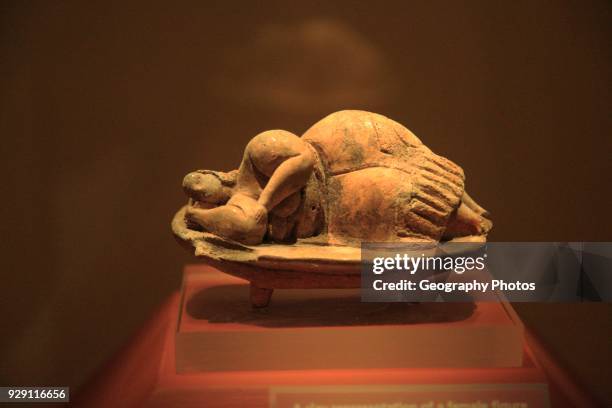 Sleeping Lady carved stone figure from Hal Saflieni Hypogeum , National Museum of Archaeology, Valletta, Malta.