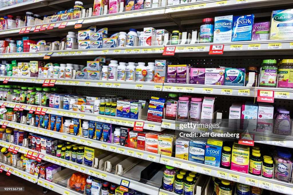 Shelves of vitamins for sale in Walmart.