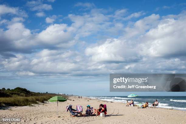 Sunbathers on the beach at Fort Pierce.