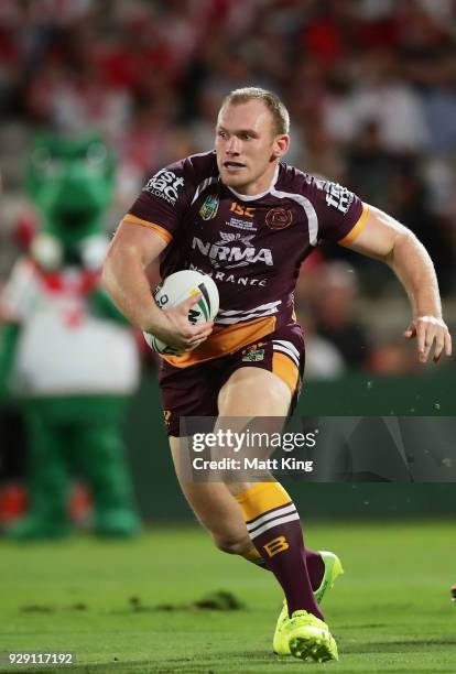 Matthew Lodge of the Broncos runs with the ball during the round one NRL match between the St George Illawarra Dragons and the Brisbane Broncos at...