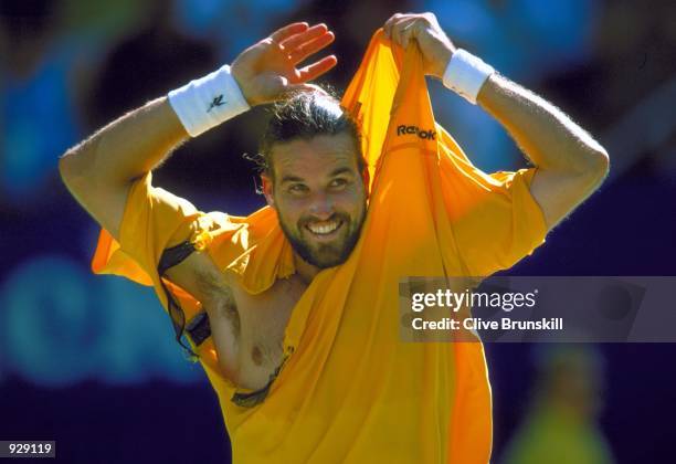 Pat Rafter Rips Shirt 2,462 Australian Open 2001 Photos & High Res Pictures - Getty Images