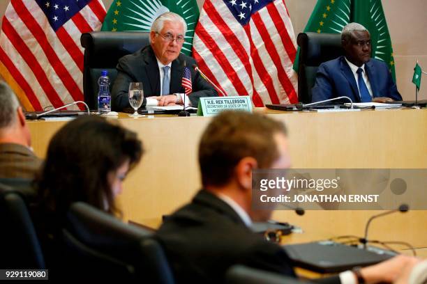 African Union Commission Chairman Moussa Faki , of Chad looks on as US Secretary of State Rex Tillerson speaks during a meeting at AU headquarters in...