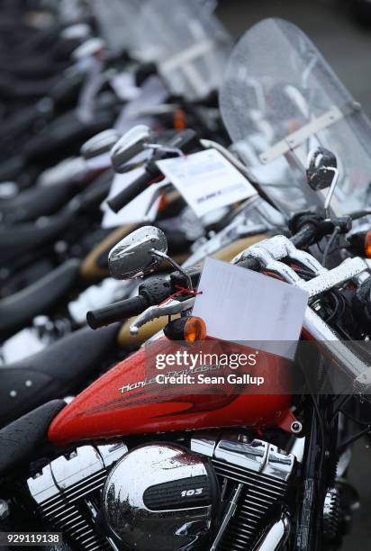 Harley-Davidson motorcycles stand on display at a dealership on March 8, 2018 in Potsdam, Germany. U.S. President Donald Trump has promised to...