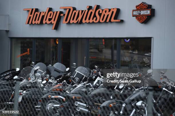 Harley-Davidson motorcycles stand on display at a dealership on March 8, 2018 in Potsdam, Germany. U.S. President Donald Trump has promised to...