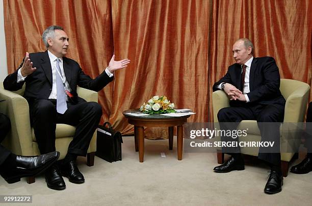 Russian Prime Minister Vladimir Putin meets with CEO of Siemens Peter Loescher in Moscow on November 9, 2009. The two sides discussed cooperation in...