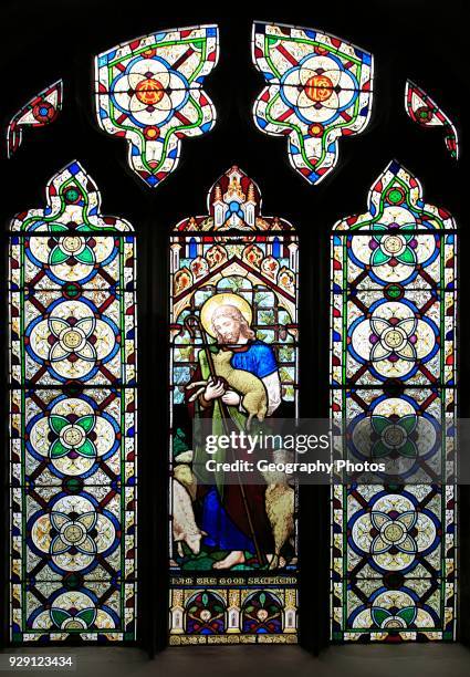 The Good Shepherd, stained glass window, Church of Saint Mary, Mendlesham, Suffolk, England, UK.