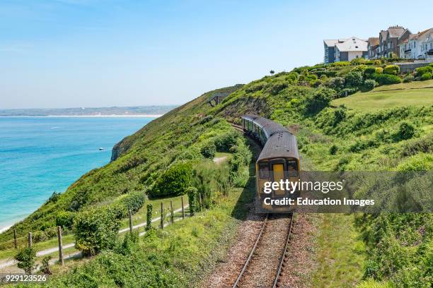 The St. Ives Branch Railway Line Passing Carbis Bay In Cornwall, England, Britain, Uk.