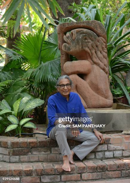 Indian architect Balkrishna Doshi winner of the Pritzker Architecture Prize, poses at his residence in Ahmedabad on March 8, 2018. - Trailblazing...